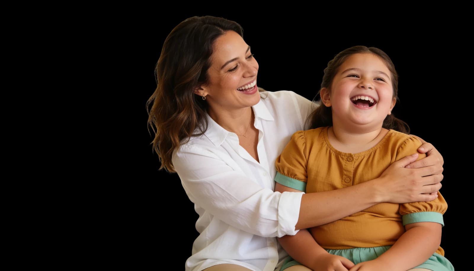 A mother and daughter laughing together